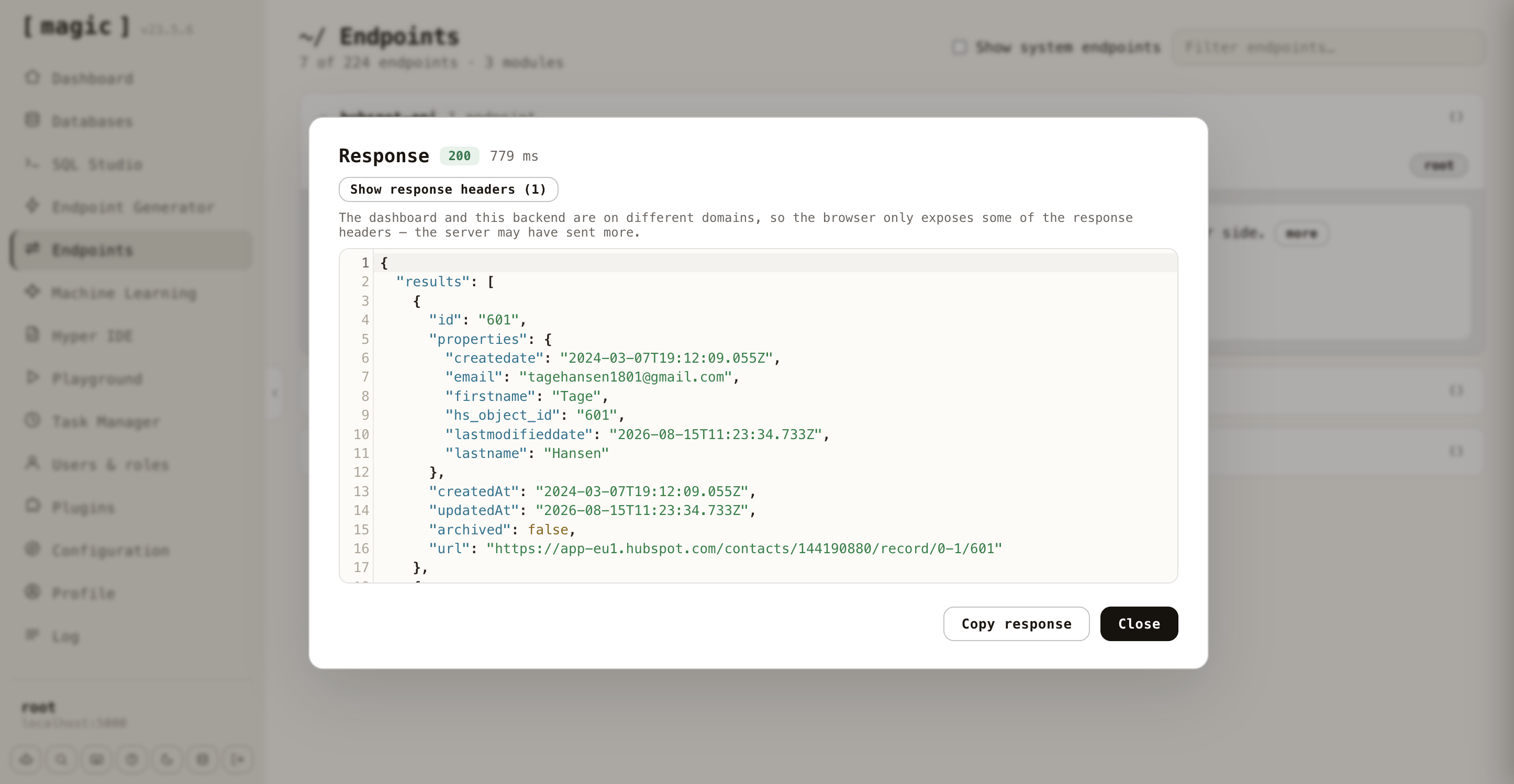 The Endpoints screen invoking the generated endpoint and returning HTTP 200 in 779 milliseconds, with a live HubSpot contact record in the response body
